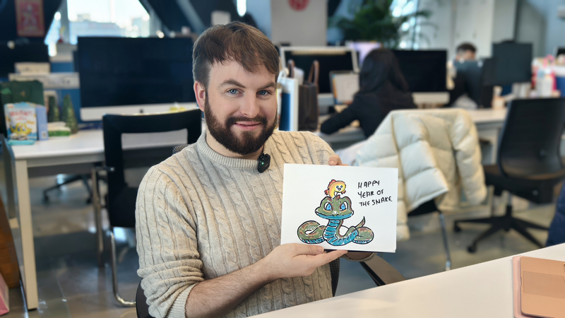 春節の吉祥を描くヘビと錦鯉 CGTNアートに込めた願い video poster