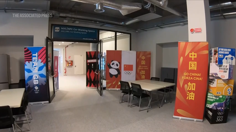 ミラノ・コルティナ冬季五輪の選手村が本格稼働、国旗とAIでにぎわう