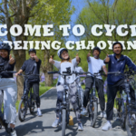 北京・朝陽区で春のサイクリングを楽しむ。バー川沿いの蘭を見ながら、街中を巡る video poster